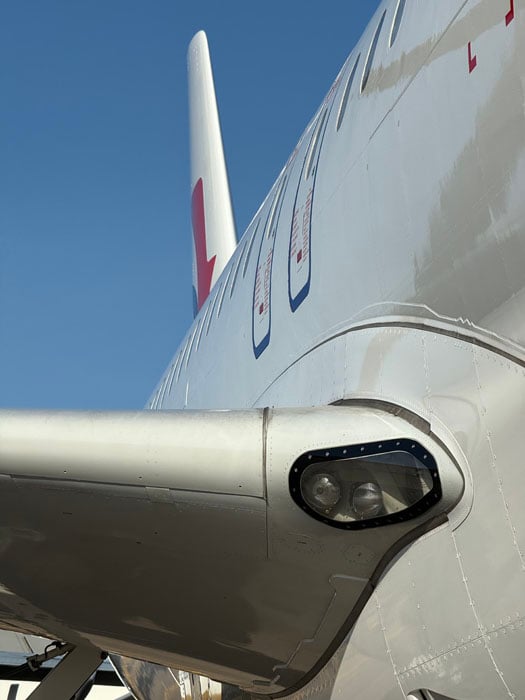 Landing lights are mounted in the root of the Comac-designed supercritical wing.