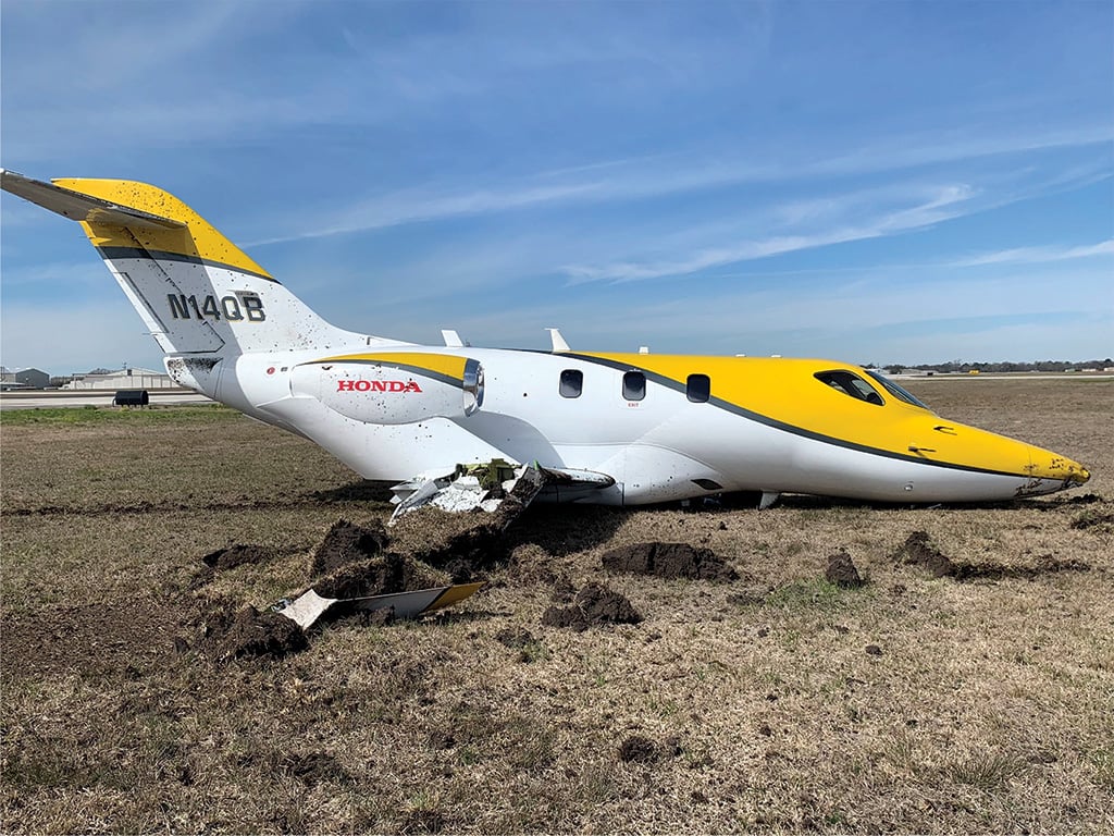 damaged aircraft near runway