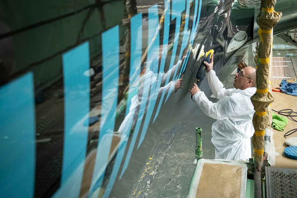 stripping paint off airplane