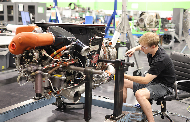 Tag Aero technician works on APU