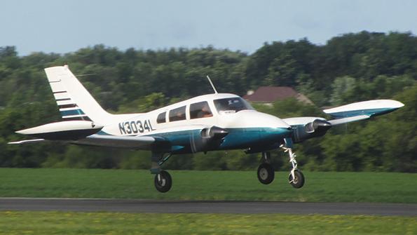 twin-propeller aircraft landing