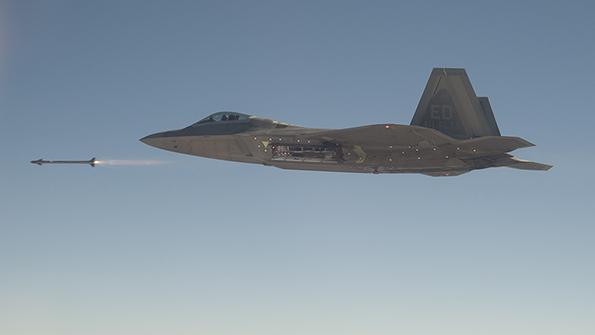 F-22 fires AIM-9X