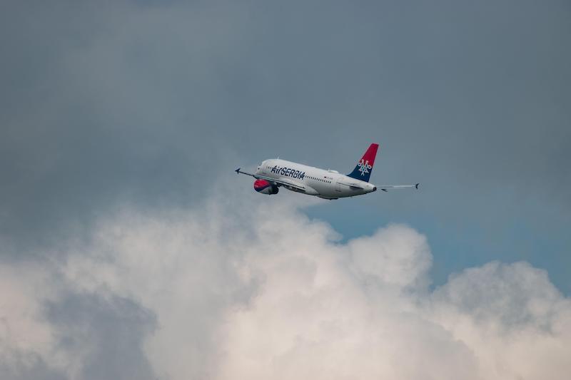 air serbia jet in clouds