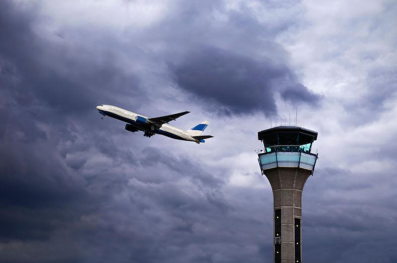 airplane at ATC tower luton