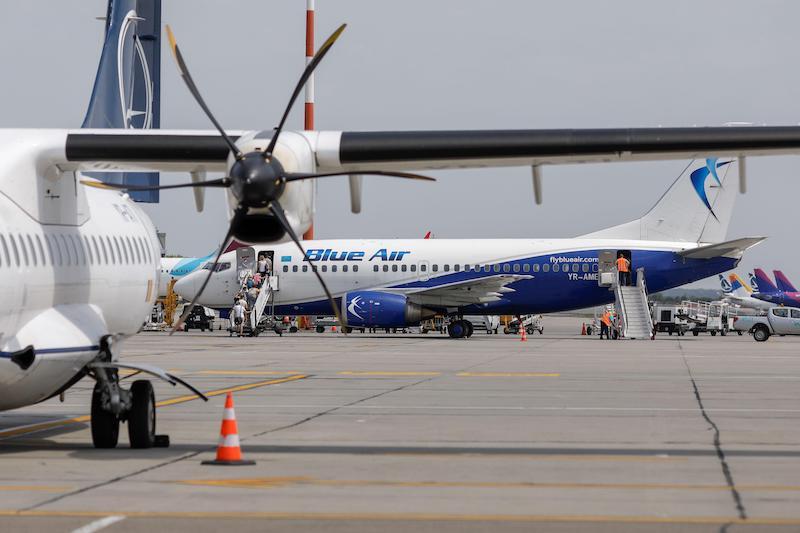 blue air jet on tarmac