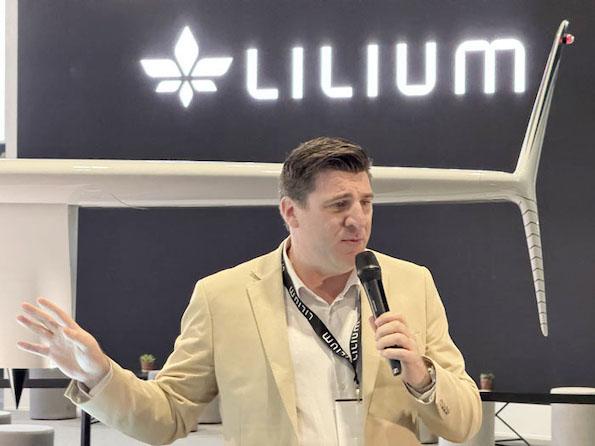 Lilium chief commercial officer sebastien borel speaking at ebace 