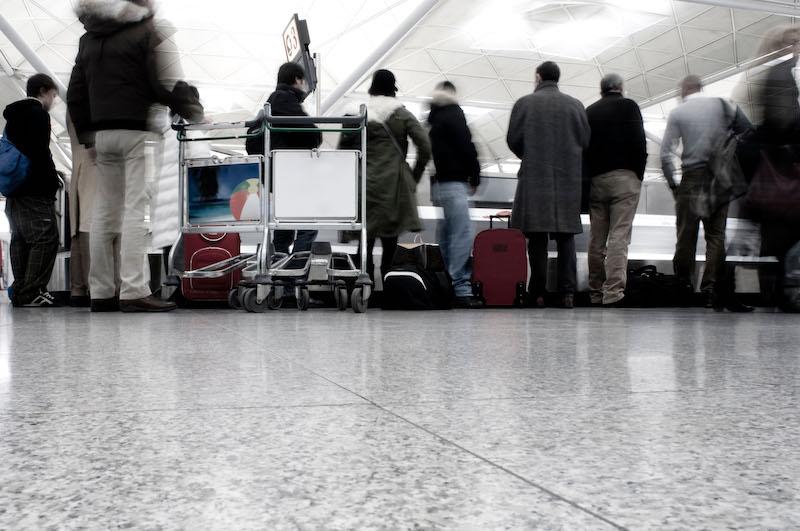 people getting luggage airport