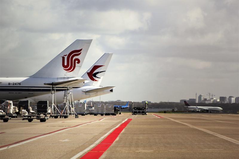 china eastern and air china tail fins on tarmac