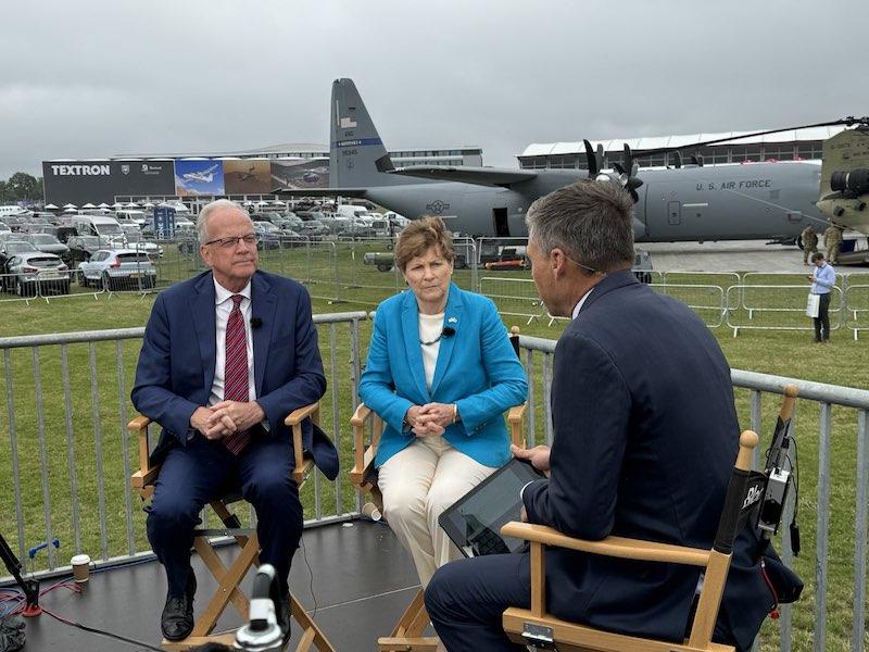 Sen. Jerry Moran (R-Kansas), left, and Sen. Jeanne Shaheen (D-N.H.), right, speak at the Farnborough International Air Show.