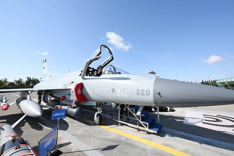 Azerbaijani President, Ilham Aliyev sits in one of the Pakistani Air Force JF-17s deployed to Baku for the ADEX defense show held Sept. 24-26.