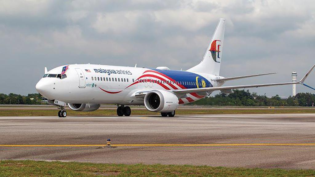 Malaysia Airlines aircraft on runway