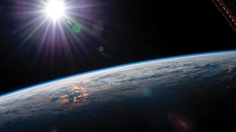 View from space of Earth and Sun