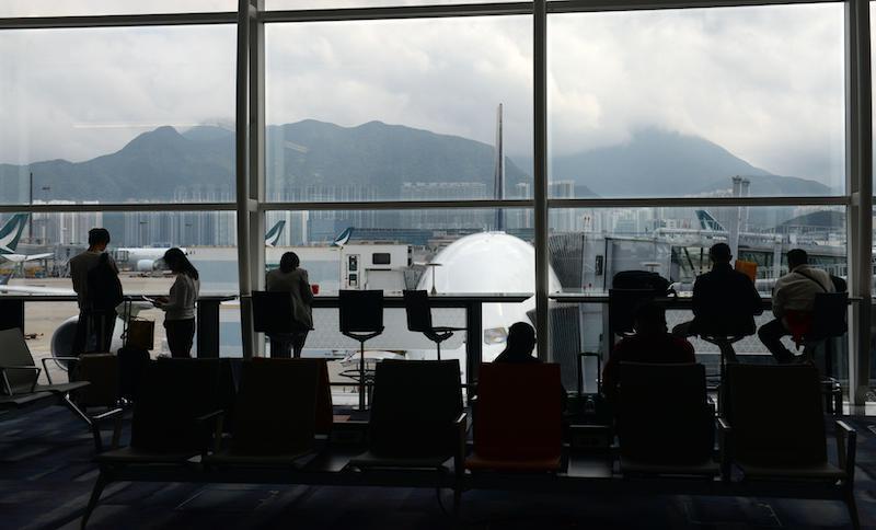 Passengers in the terminal at Hong Kong International Airport