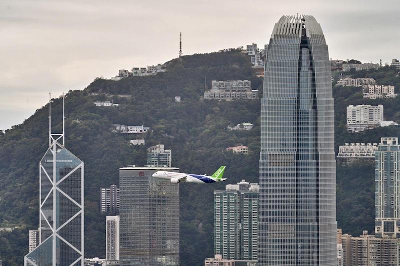 A C919 flight demonstration over Hong Kong in December 2023