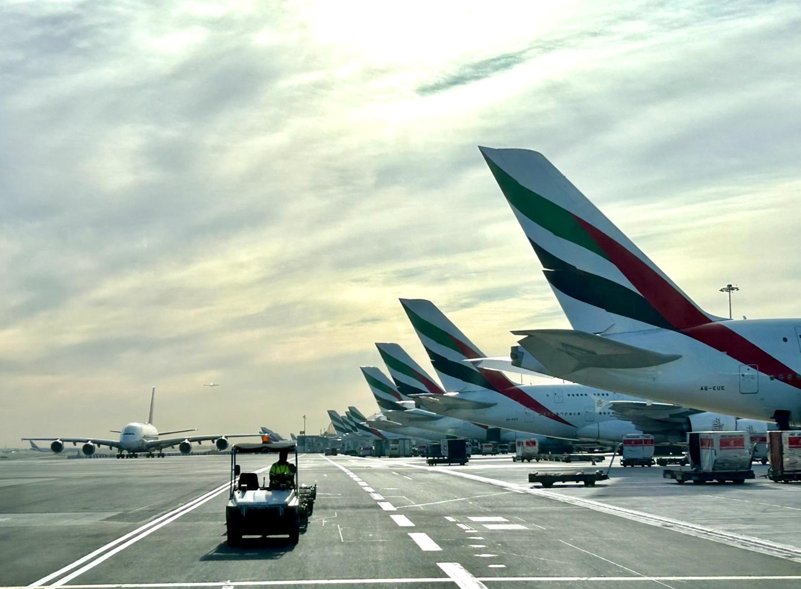 Emirates aircraft line up during the morning rush at Dubai International Airport.