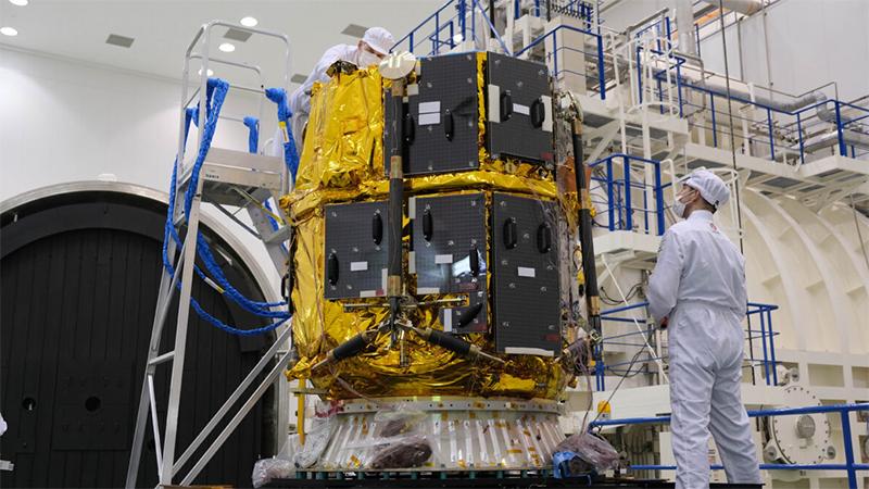 Two iSpace employees working on thermal vacuum chamber