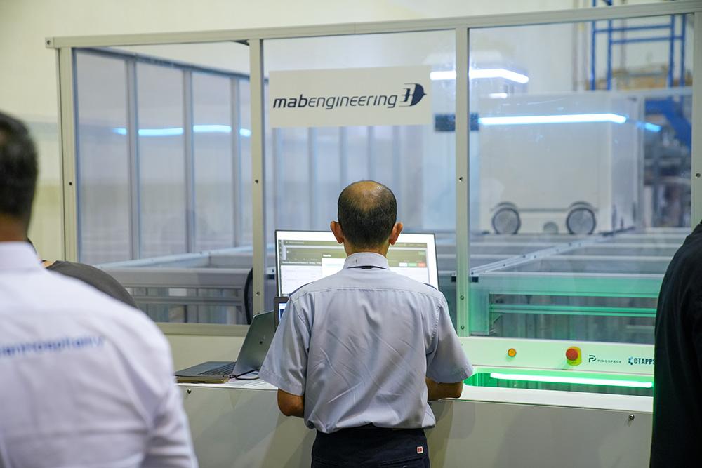 MAB Engineering technician in front of screen