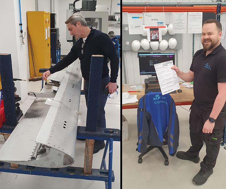Technicians working on components and holding paperwork