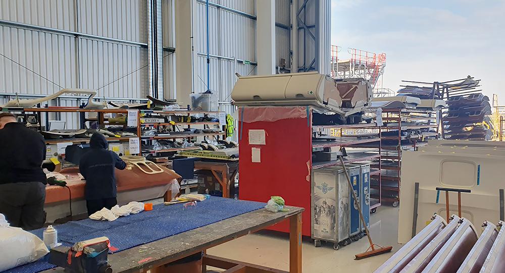 Parts on shelves in hangar