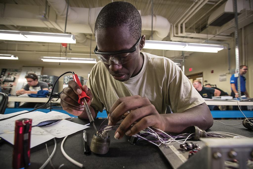 technician working on part 