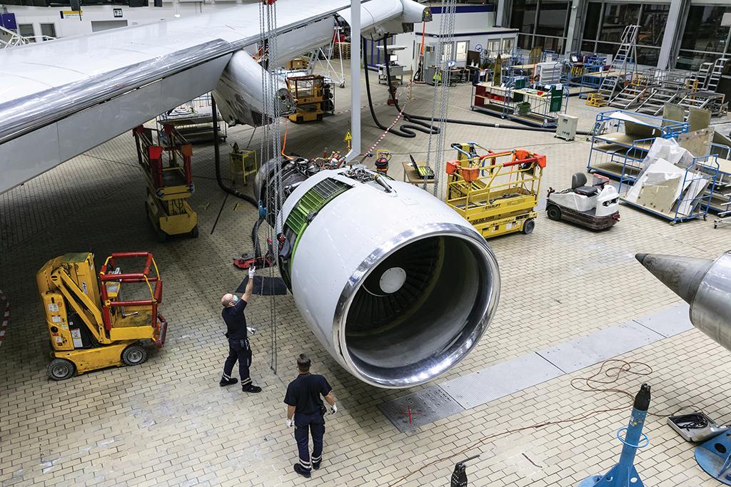 technicians at maintenance facility