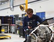 EPCOR technician repairing APU at its shop in the Netherlands